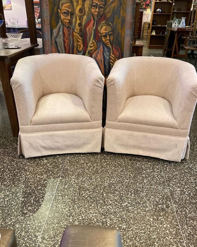 White upholstered tub chairs, they swivel! 2 available 26.5” x 27” x 27.5” seat height 14.5” Call 202-232-8171 to purchase 