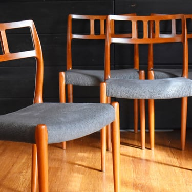 Four Danish teak Niels Moller 79 dining chairs w/gray "matrix" upholstered seats 