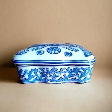 VINTAGE Asian ceramic box showcasing shells in traditional blue white Intricately designed blue white porcelain lidded box with shell theme 
