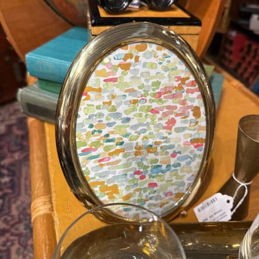Oval brass frame