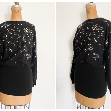 Whimsical ‘80s New Wave sweater or micro mini dress | black lambswool embellished with rhinestones & metal trinkets, S 