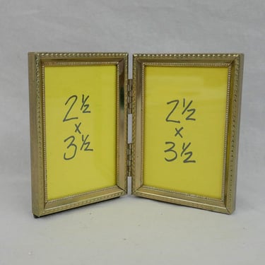 Small Vintage Hinged Double Picture Frame - Gold Tone Metal w/ Glass - Holds Two Wallet Size 2 1/2