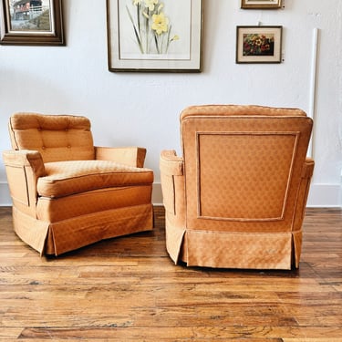 Carmella's Pair of Orange Swivel Chairs