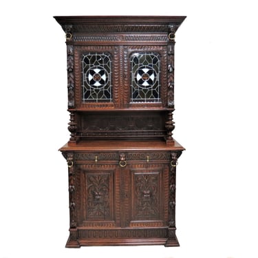 Tall Storage Cabinet | Antique French Heavily Carved Hunt Cabinet With Stained Glass Doors Circa 1880 