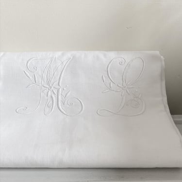 Beautiful vintage French linen sheet with initial ML 