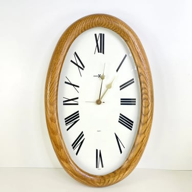 Vintage Howard Miller Model 622-836 Oval Golden Oak Wall Clock Modern Face WORKS