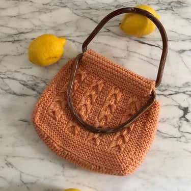 70s cable knit purse / vintage peach wool cable knitted tapestry lucite handle / top handle hand knit bag purse handbag 