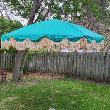Groovy Teal and White Fringe Patio Umbrella with Flower Inside 