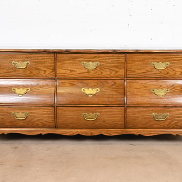 Baker Furniture French Provincial Louis XV Oak and Burl Wood Bombay Form Triple Dresser or Credenza, Circa 1960s