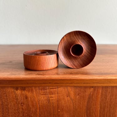 MCM teak candleholders / pair of round wooden Danish modern taper holders 