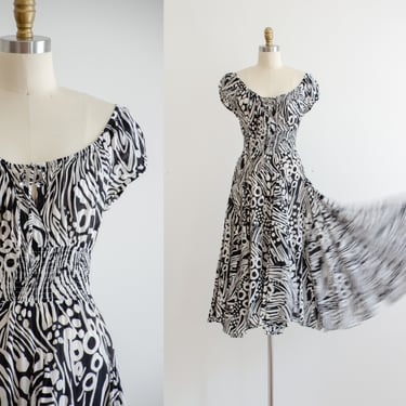 black cotton dress | y2k vintage black white abstract pattern off shoulder scoop neck flowy midi dress 
