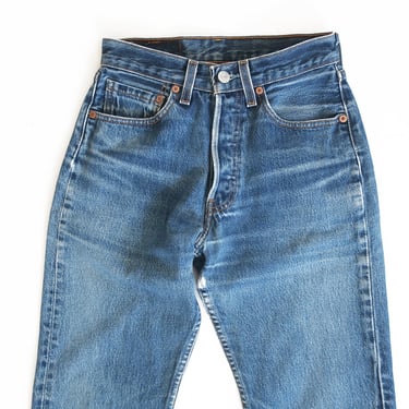 vintage Levis 501s / distressed Levis / 1990s distressed Levis 501 high waist button fly petite jeans 25 