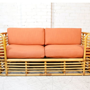 Vintage mid-century modern rattan loveseat sofa with burnt orange upholstery | Free delivery in NYC and Hudson Valley areas 