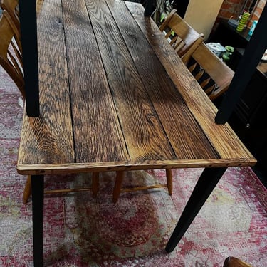 Reclaimed wood dining table. 61.5” x 28.5” x 30” 