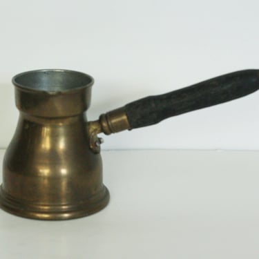 brass pouring vessel with wood handle 