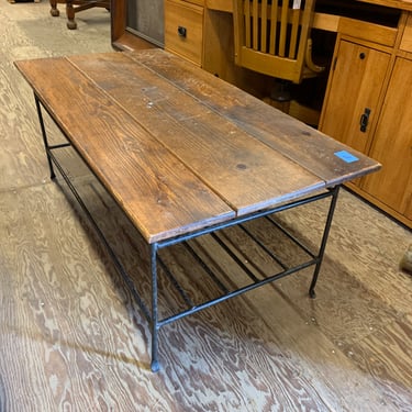 Wood coffee table with iron legs, 24 x 48 x 19”