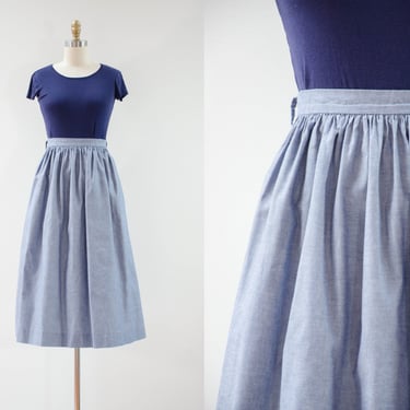 light blue cotton skirt | 80s 90s vintage cottagecore academia style fit and flare button down chambray skirt with pockets 