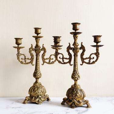 pair of 1920s French rococo gilt brass candelabras