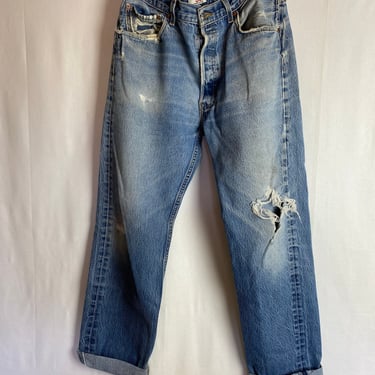 Levis 501’s distressed with holes Naturally worn-in Button fly denim jeans workwear medium blue wash out size 34” waist tall 