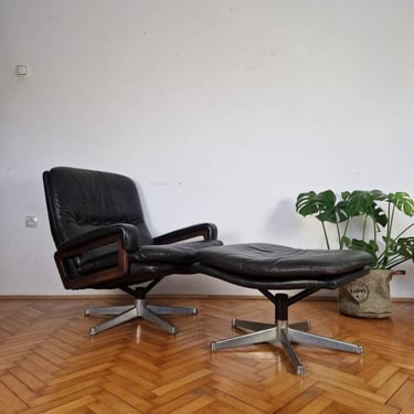 Vintage Black Leather Lounge Chair / Mid Century Armchair with Stool / King Lounge Chair / André Vandenbeuck Design / 1960s 