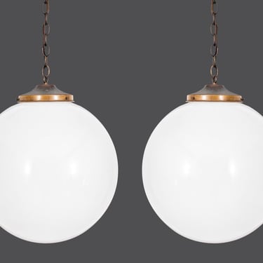 Modernist Pair of Glass Globe Pendants