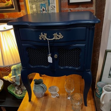 Blue painted nightstand by Kent Coffey. 21” x 16.5” x 26.5” 