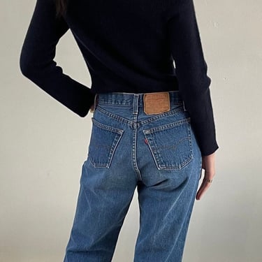 80s Levis 501 jeans / vintage women’s high waisted Levis 501 medium dark wash faded denim button fly jeans | 28 x 32 size 4 
