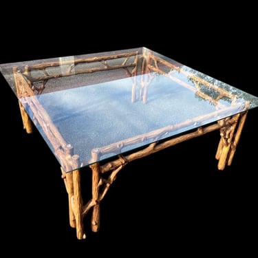 Great vintage heavy metal faux bois tree branch coffee table with glass top 