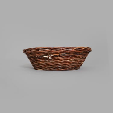 Vintage woven grape vine twig harvest basket 