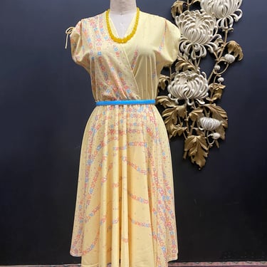 1970s dress, yellow floral, vintage 70s dress, fit and flare, wrap style, full skirt, size medium, tie sleeves, pastel flowers, summer, 28 