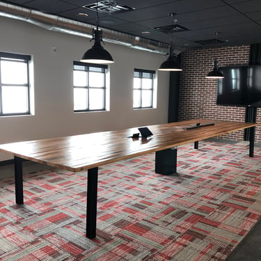 Conference Table with power/grommet made of Reclaimed Mixed Hardwoods, slightly rustic finish and black I beam legs.  Customization welcome. 