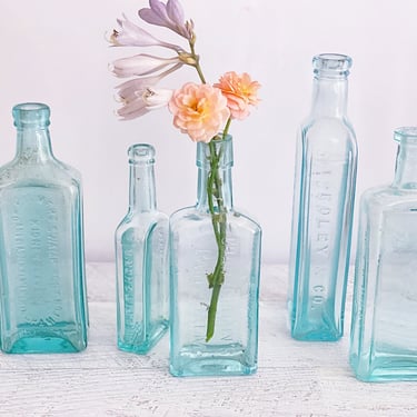 Antique Blue Glass Medicine Bottles – Set of 5 Embossed Quack Cure Apothecary Jars, Upcycled Mini Vases for Cottage Chic Decor 