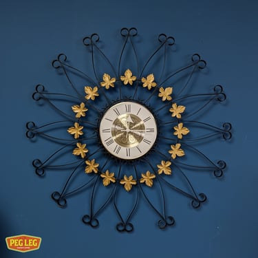 Mid-Century Modern wrought-iron wall clock