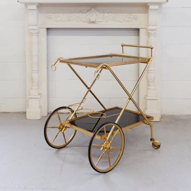 1970s French brass and smoky glass bar cart