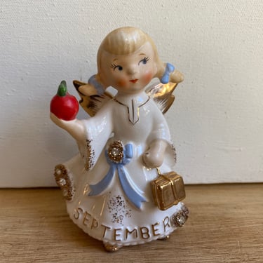 Vintage Lefton September Angel, Girl With Apple, Gold Books And Blonde Pig Tails, Blue Bow With Gold And Rhinestones 
