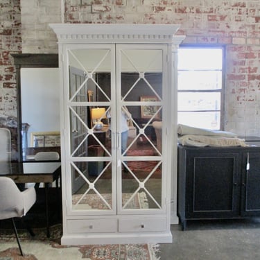 ONE OF TWO LARGE CUSTOM MIRRORED ARMOIRE CABINETS