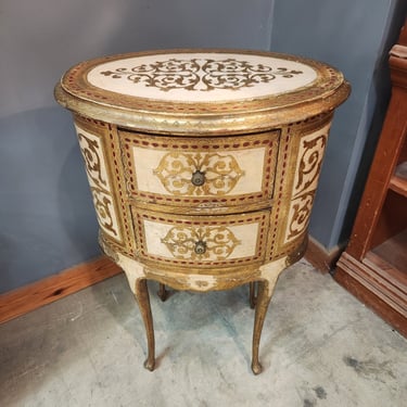 Florentine Gold Oval Chest of Drawers