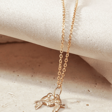 Kissing bird necklace