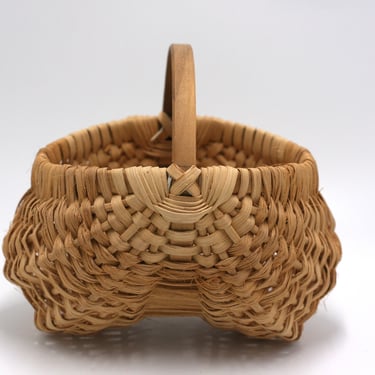 vintage buttocks basket or egg basket 