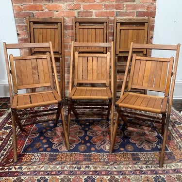 Wooden slatted folding chairs (6 available)
