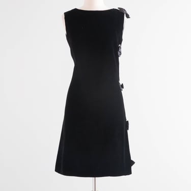 Fabulous 1960's Black Velvet Shift Dress With Rhinestone Grommet Sides and Bows / Medium