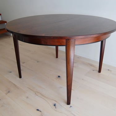 Danish Modern Omann Jun Rosewood Round to Oval Dining Table No.55 with One Leaf 