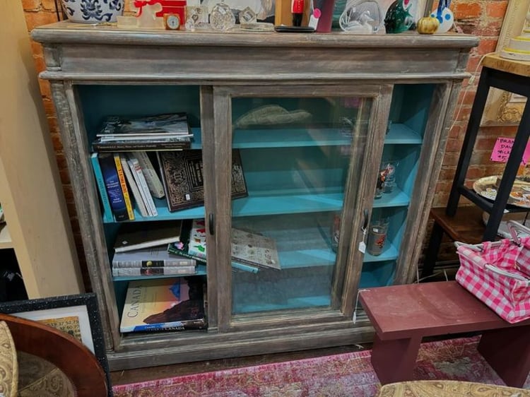 Washed green-gray shelving unit with robins egg blue interior. 49 x 14 x 48” 