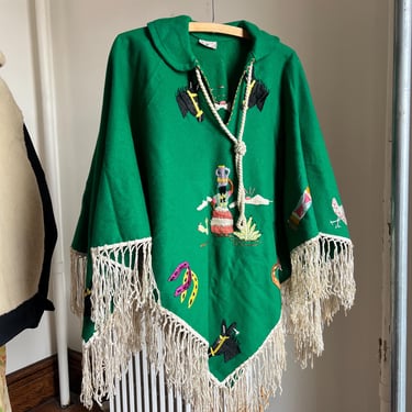 1940’s/50’s vintage green felt Mexican souvenir poncho with donkeys, horseshoes, and sombreros embroidery and cream fringe 