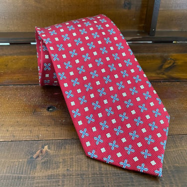 Vtg red geometric medallion silk tie. Foulard pattern necktie for business interviews and dress-up date nights by Cape Cod Neckwear 