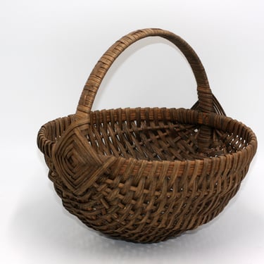 vintage ash or oak splint basket with eye of god 