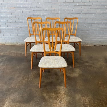 “Ingrid” teak dining chairs by Niels Koefoed