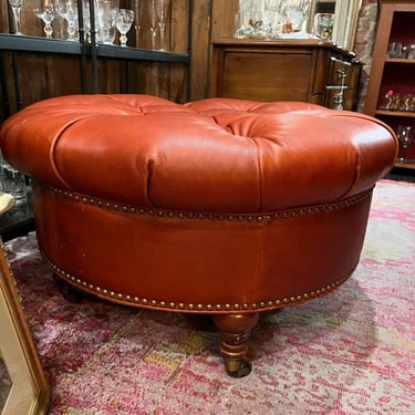 Big tufted ottoman or living room island on wheels. 33” across 18” tall. 