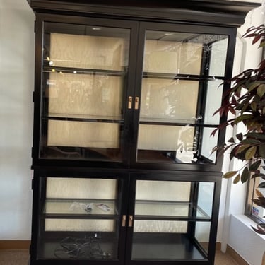 Display Cabinet with Glass Doors<br />Black Wood<br />Lighted<br />Gold Upholstery<br />W 58 x D 18.5 x H 84