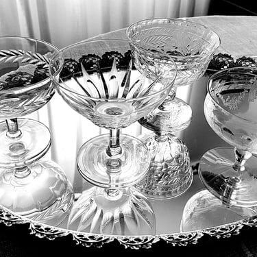 Mismatched vintage stemware 4 coupe champagne cocktail glasses. Mixed patterns etched and cut elegant glass coupes. MCM Mid Century barware. 
